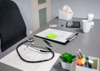 doctor-desk-with-documents-and-stethoscope-2025-03-14-07-48-49-utc-scaled.jpg